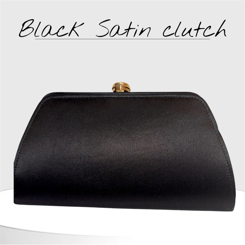 Elegant Black Satin Clutch with Rhinestone Clasp
- Perfect for Any Occasion!